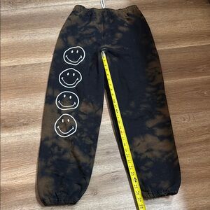 Black and Brown Joggers with Neon Stripe and Smiley Graphic